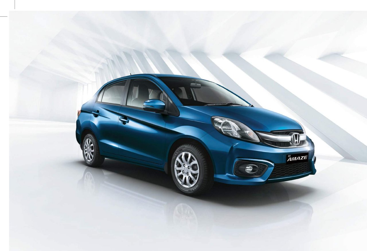 2016 India-spec Honda Amaze first-generation facelift in blue, front three-quarter studio