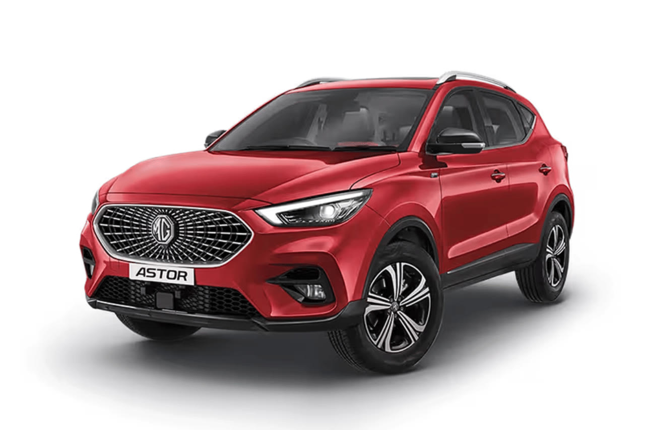 Current India-spec MG Astor in Glaze Red, front three-quarter studio