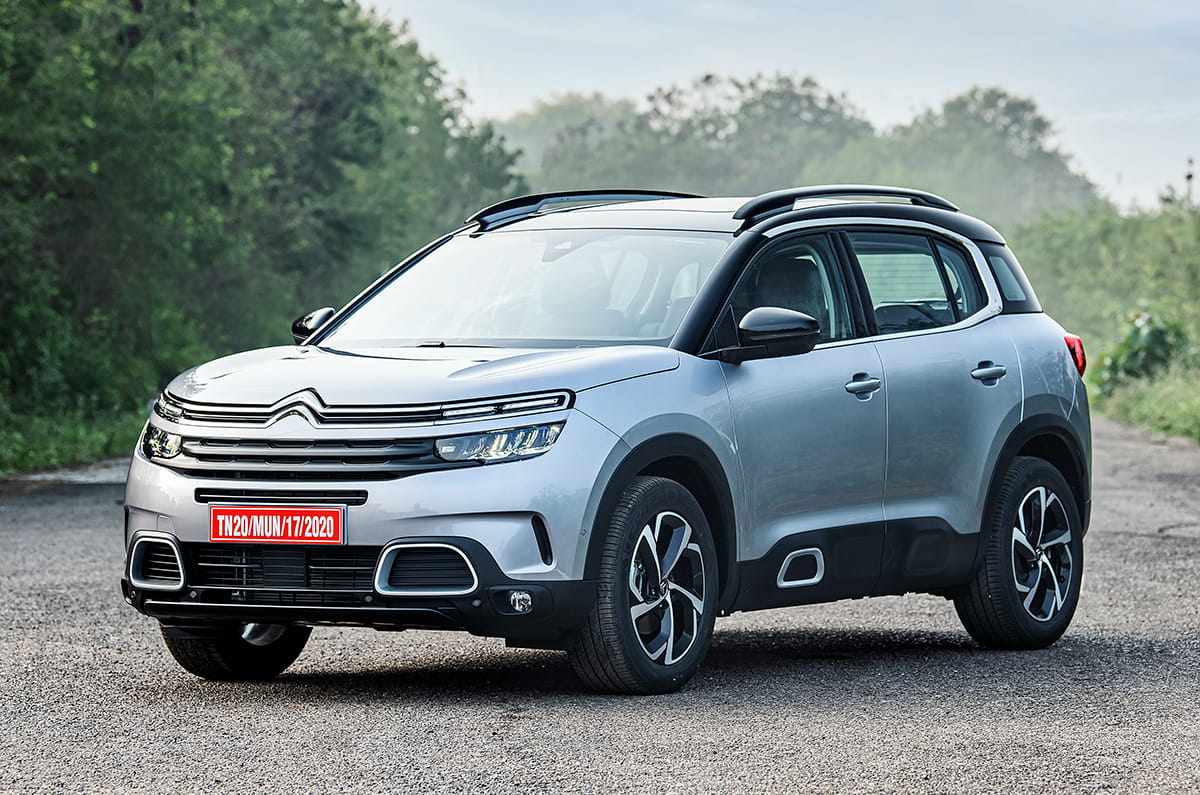 Original India-spec Citroën C5 Aircross (2021 pre-facelift), silver dual-tone, OEM press front three-quarter