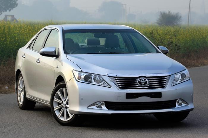 Original India-spec Toyota Camry XV50 (2012–2015), silver, OEM press front three-quarter