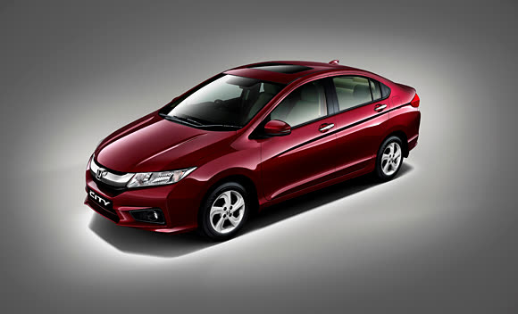 2014 India-spec Honda City fourth generation, Radiant Red Metallic, front three-quarter studio