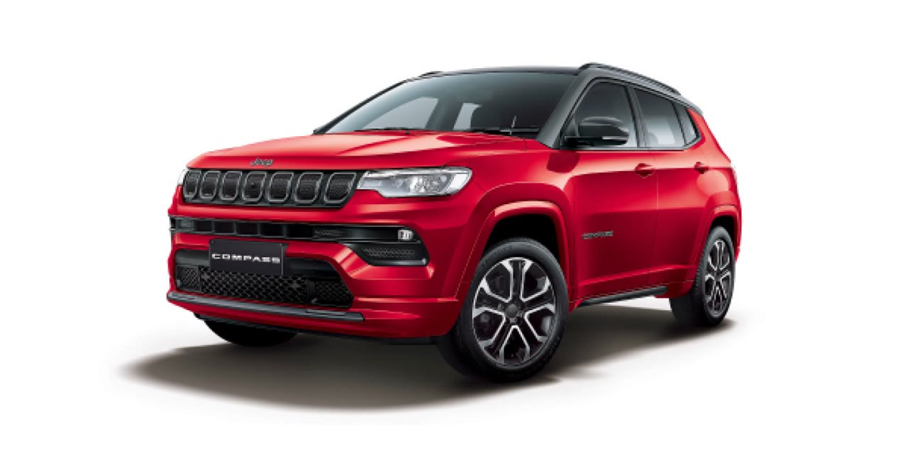Current India-spec Jeep Compass facelift, Exotica Red dual-tone, front three-quarter studio