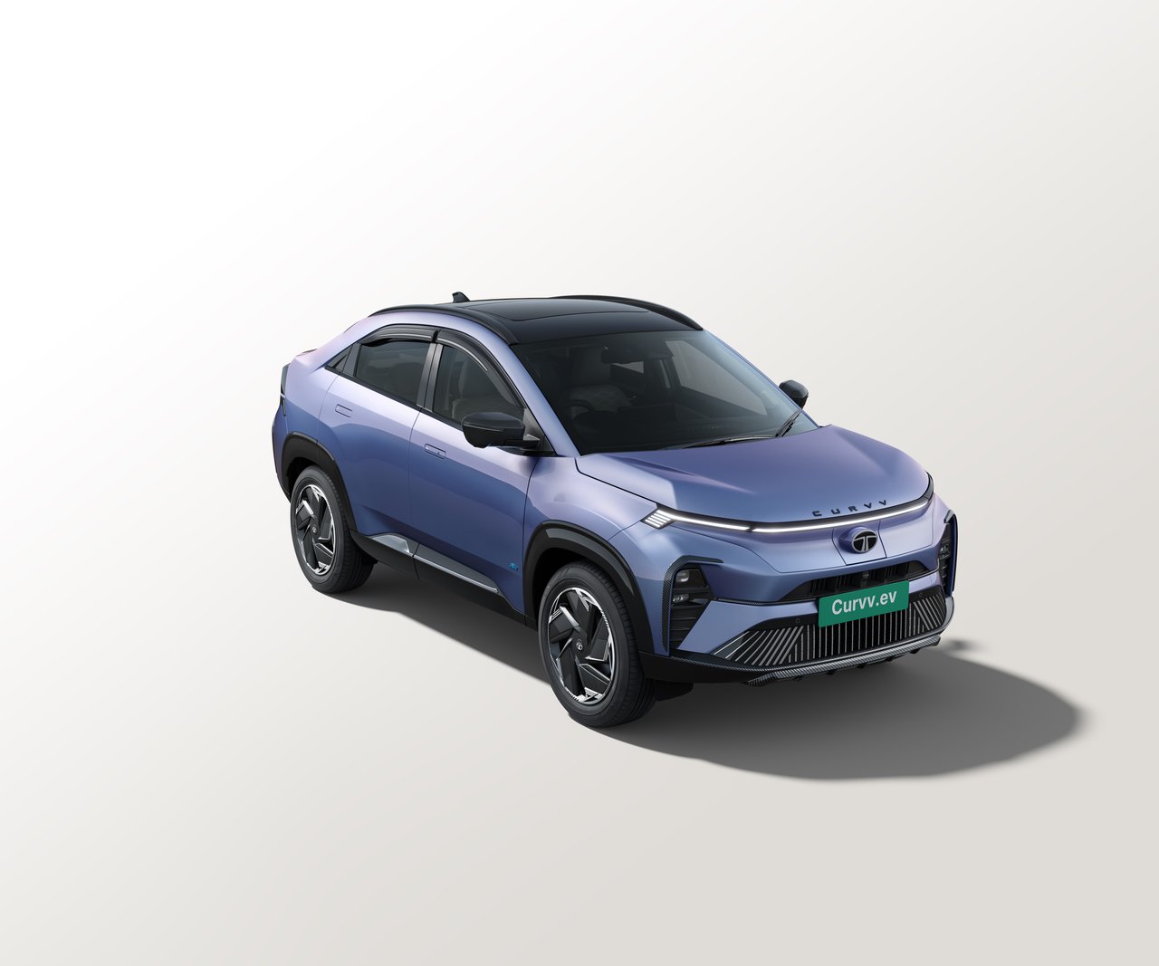 Current India-spec Tata Curvv.ev in Virtual Sunrise dual-tone, studio front three-quarter — 7 August 2024 Tata Motors launch pack