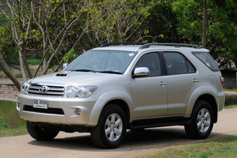 Original India-spec Toyota Fortuner first generation (2009), silver, OEM press front three-quarter