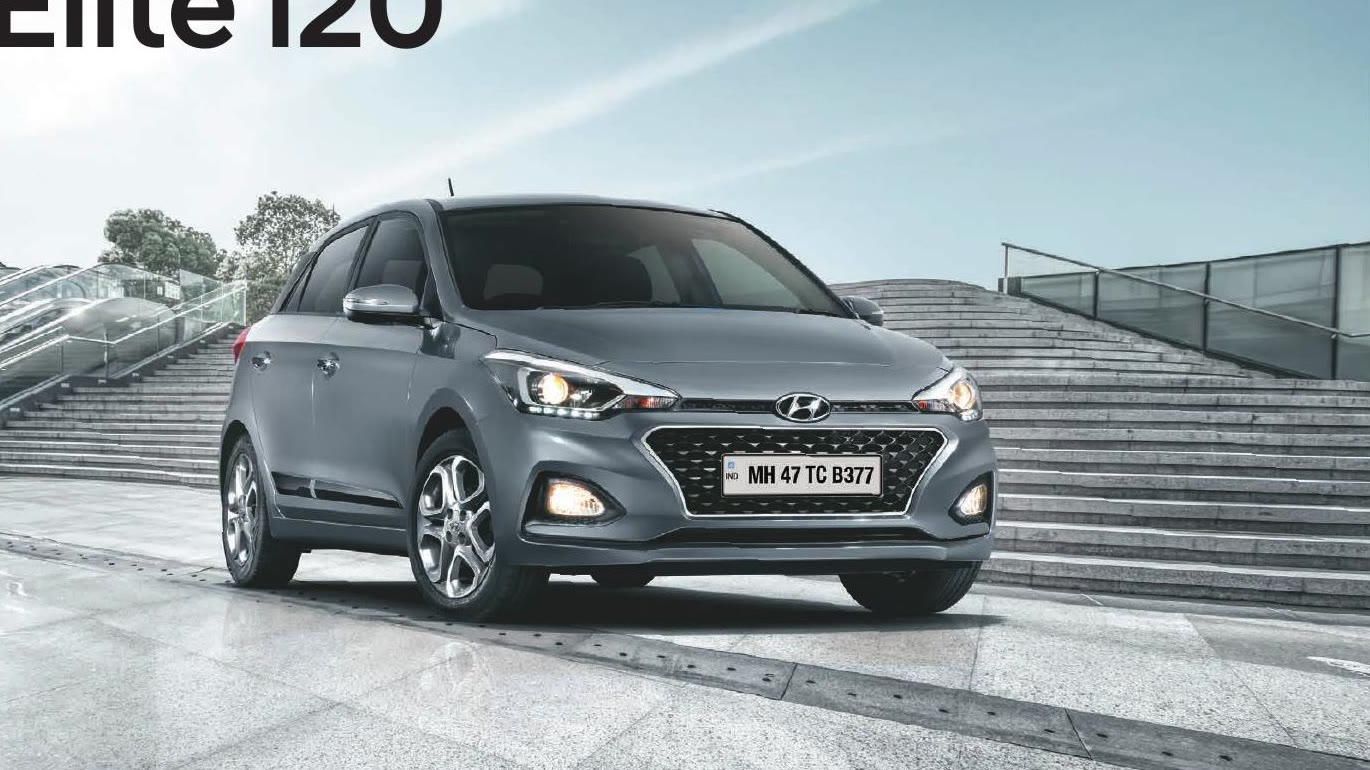 India-spec Hyundai Elite i20 2018 facelift in metallic grey, cascade grille, OEM press front three-quarter