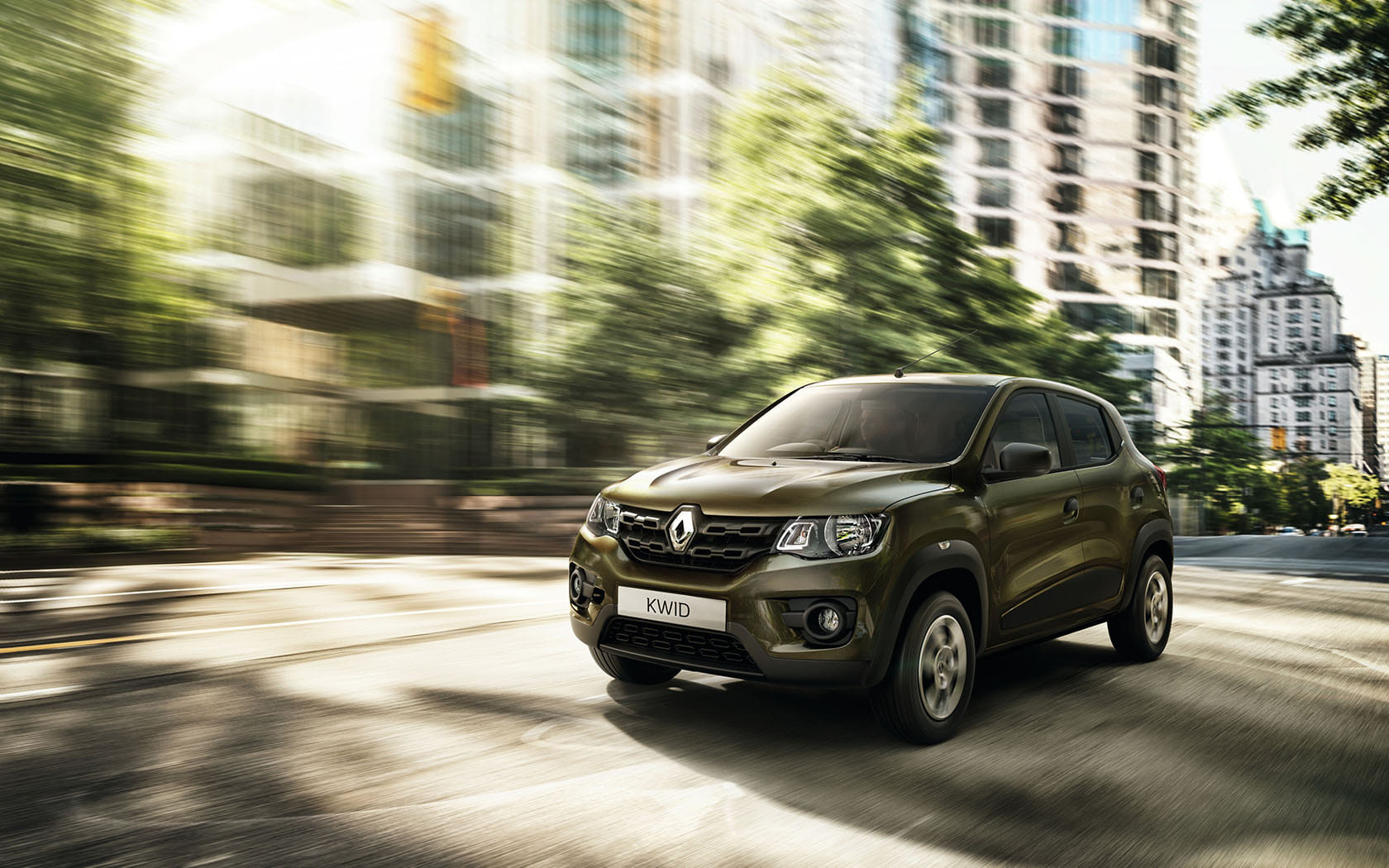 Original India-spec Renault Kwid (2015–2019 pre-facelift), Outback Bronze, OEM press front three-quarter