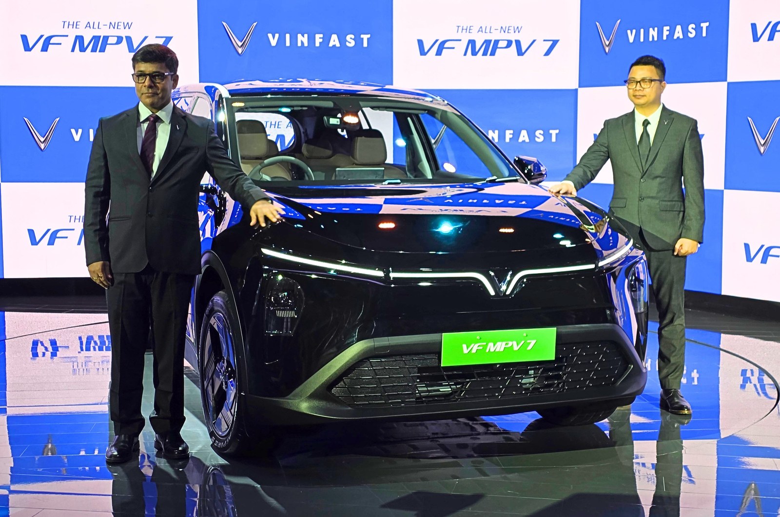 India-spec VinFast Limo Green / VF MPV 7 family three-row EV, OEM press front three-quarter