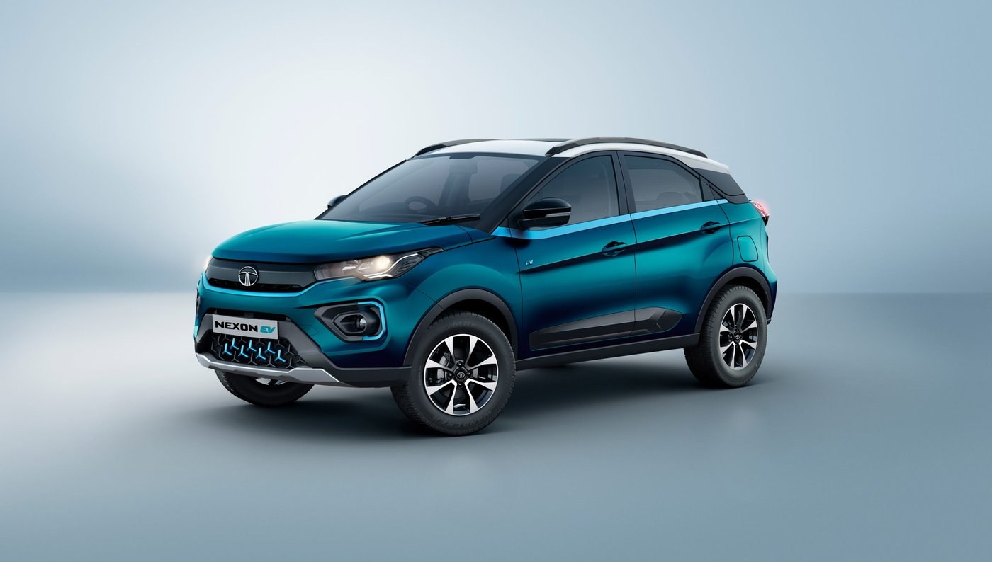 Original India-spec Tata Nexon EV (2020–2023), Signature Teal Blue dual-tone, studio front three-quarter