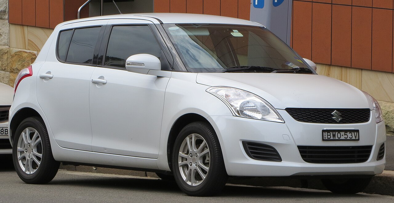 2011 Suzuki Swift second generation (FZ) GL, front three-quarter