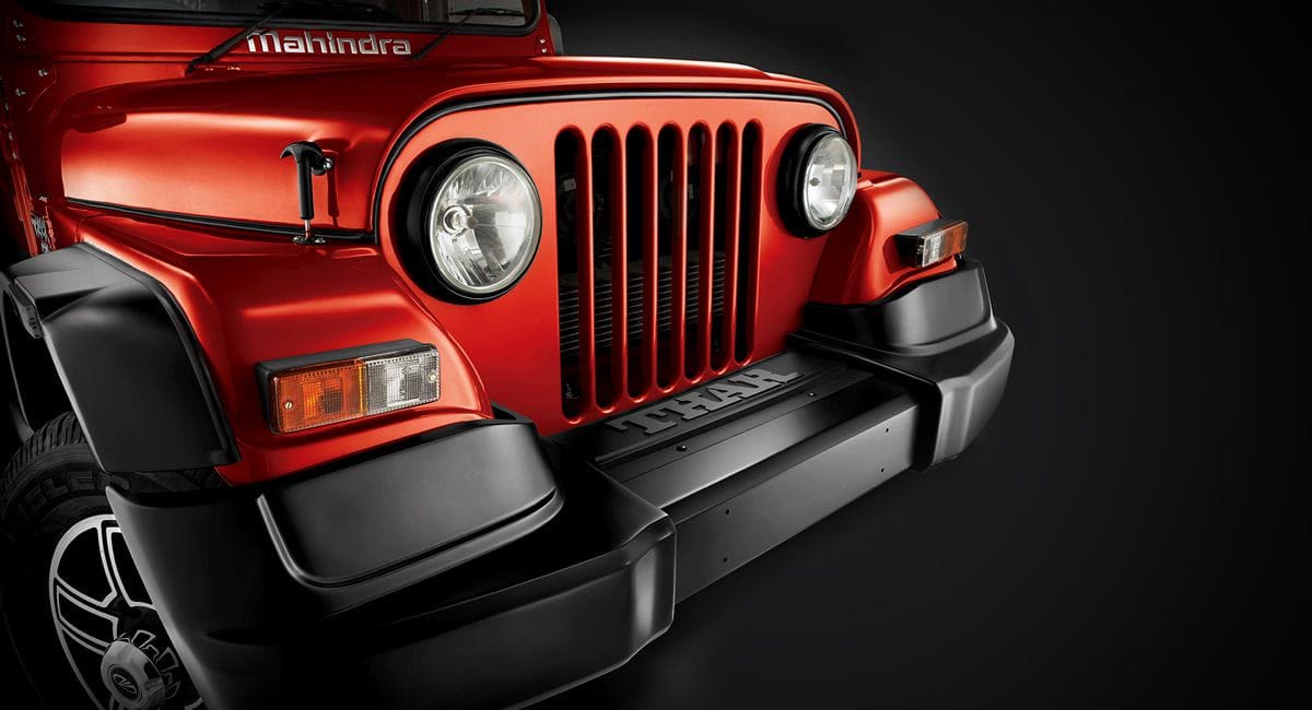 2015 Mahindra Thar CRDe facelift, red, India-spec front three-quarter studio