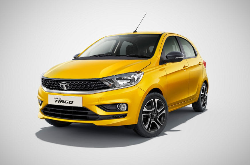 2020 India-spec Tata Tiago first facelift (Humanity Line / Impact 2.0), yellow, OEM press front three-quarter