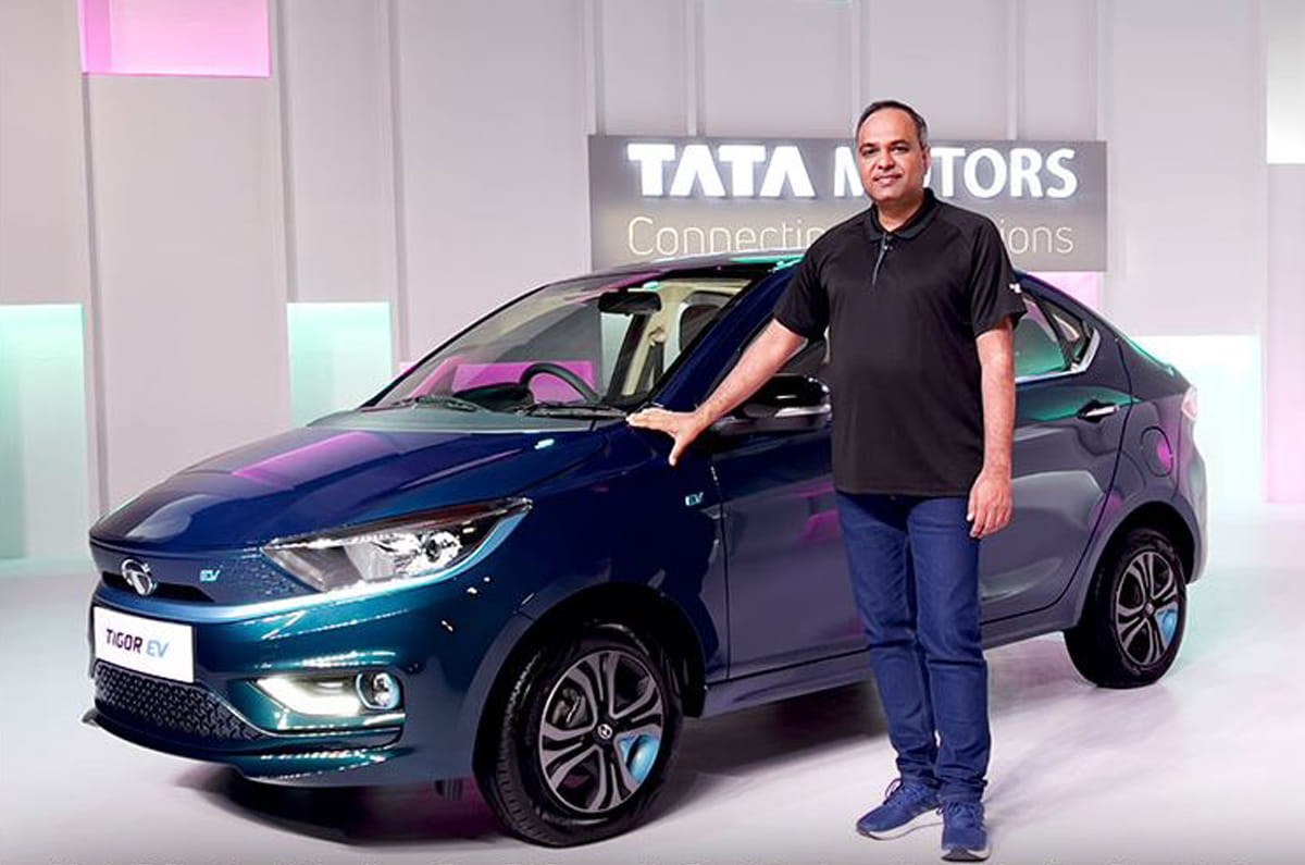 Current India-spec Tata Tigor EV (Ziptron personal), studio front three-quarter