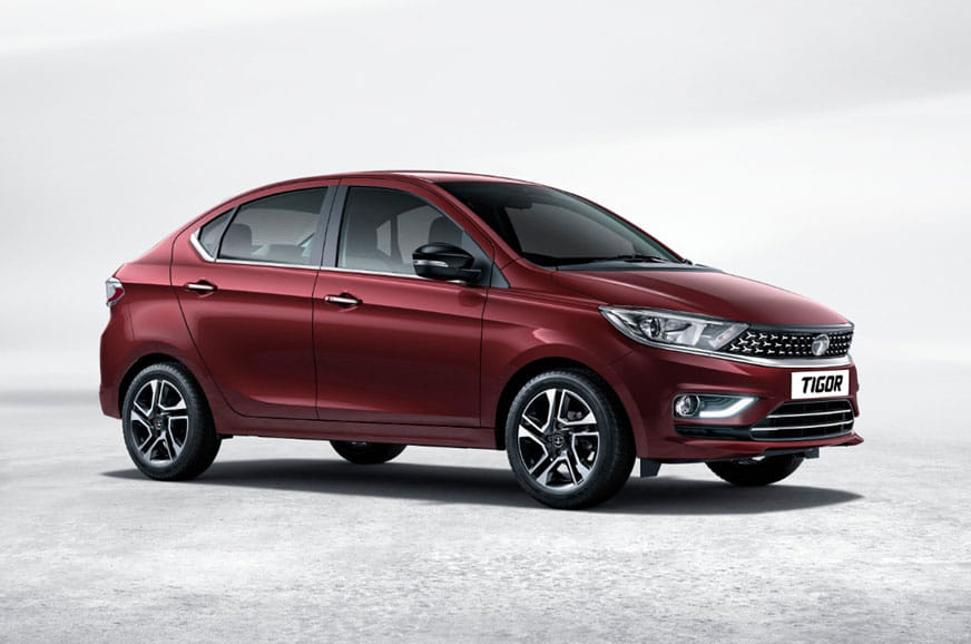 2020 India-spec Tata Tigor second facelift (BS6 / Humanity Line), maroon, OEM press front three-quarter