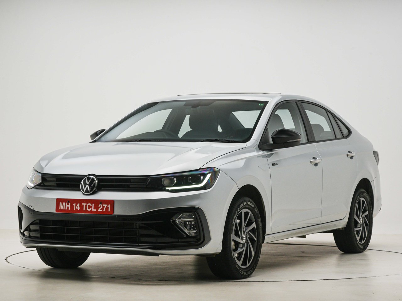 Current India-spec Volkswagen Virtus GT, Reflex Silver, front three-quarter studio