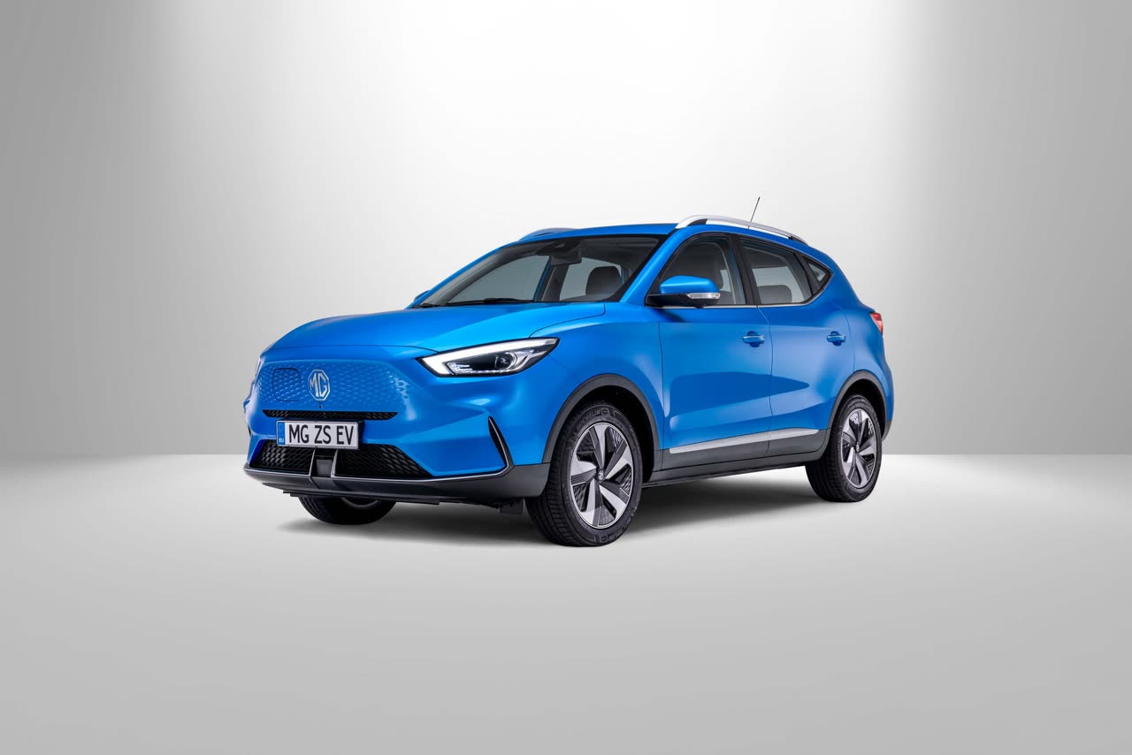 Current India-spec MG ZS EV facelift, metallic blue, front three-quarter studio
